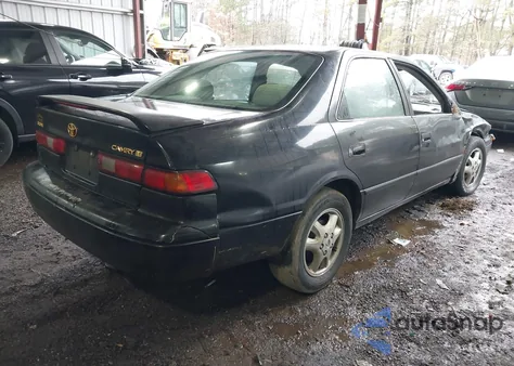 1997 Toyota Camry Le z USA, uszkodzony, nr VIN JT2BG22K5V0021599